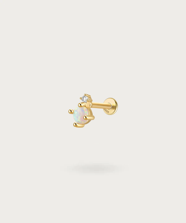 piercing met zirkonia en opaal goud helix
