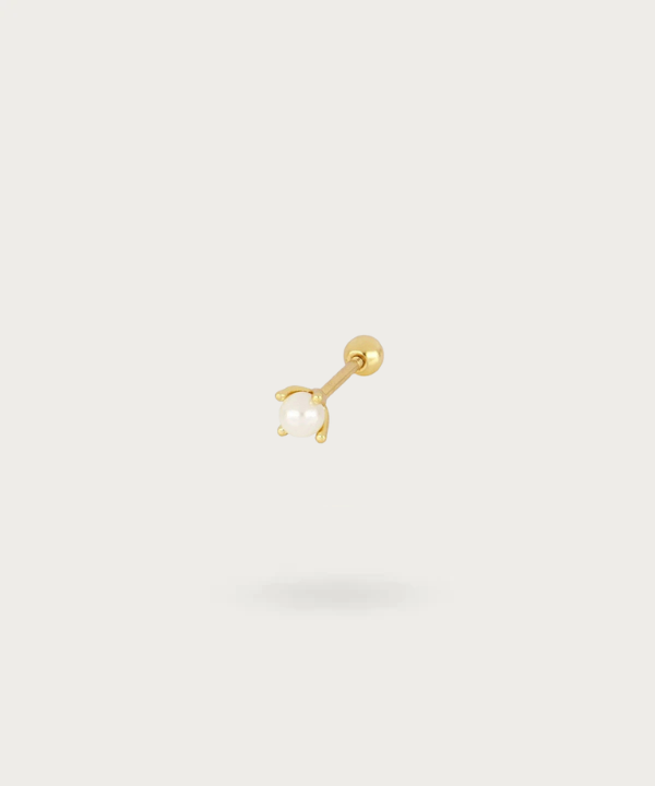 Tepelpiercing met acryl balletjes en kristallen Tepelpiercing met acryl balletjes en kristallen