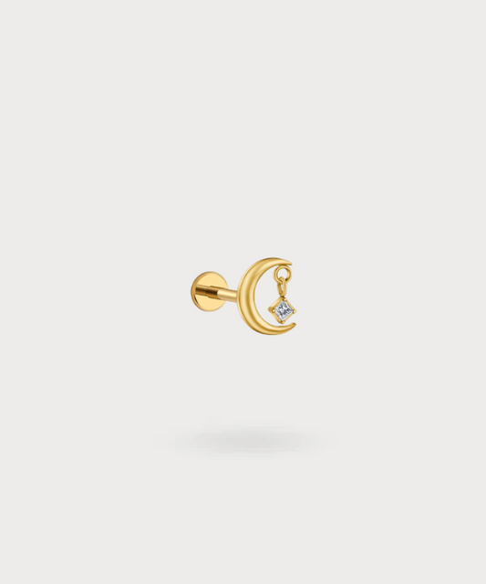 Giulia conch piercing in goudkleurig titanium, maan met fonkelende zirkonia hanger.

